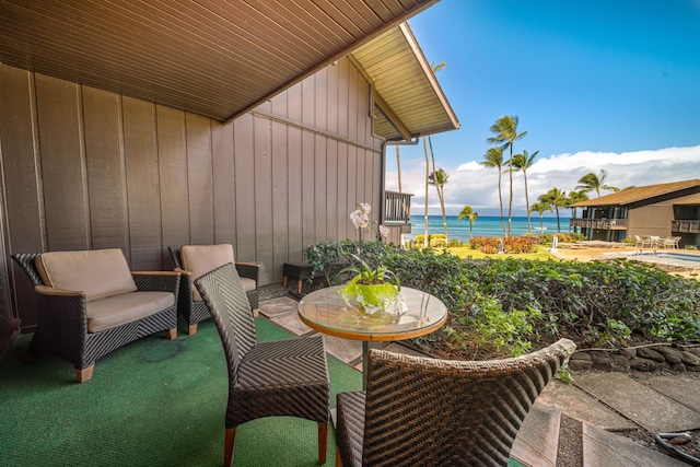 view of patio / terrace featuring a water view