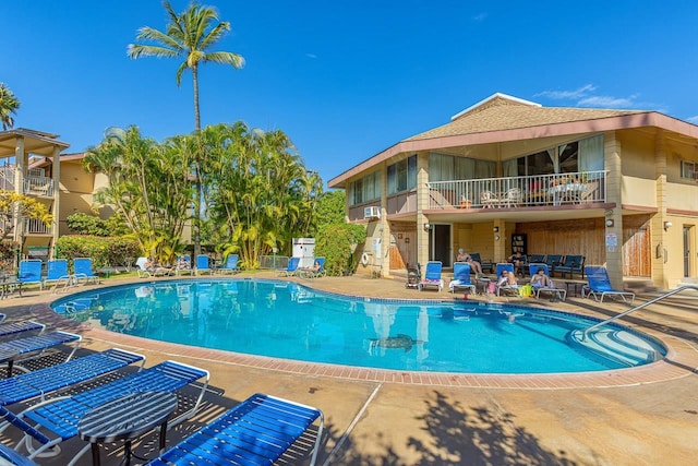 view of swimming pool featuring a patio