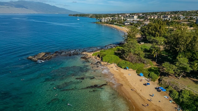 bird's eye view with a water and mountain view