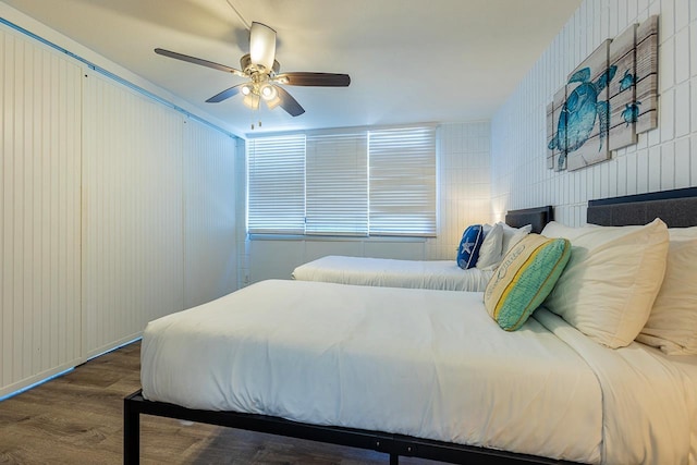 bedroom with hardwood / wood-style flooring and ceiling fan