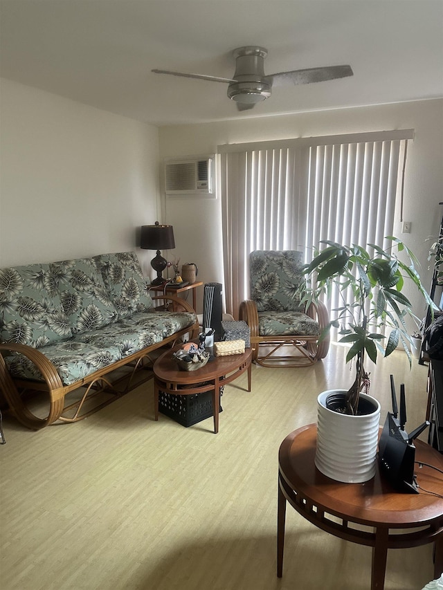 17 Kopi Ln Unit 6-102, Wailuku, HI 96793 - living area with a wall mounted air conditioner, a ceiling fan, and wood finished floors