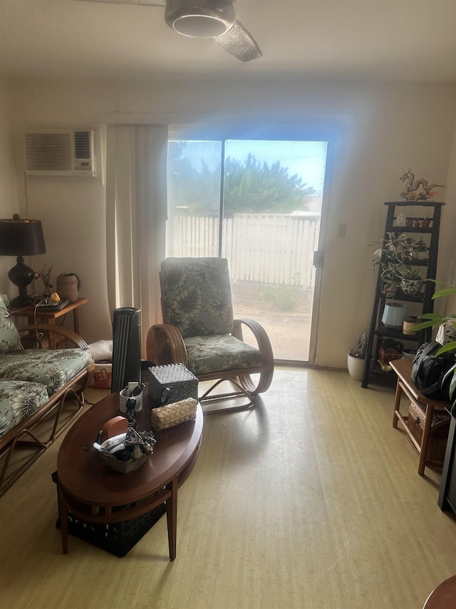 17 Kopi Ln Unit 6-102, Wailuku, HI 96793 - living area featuring an AC wall unit and light wood-type flooring