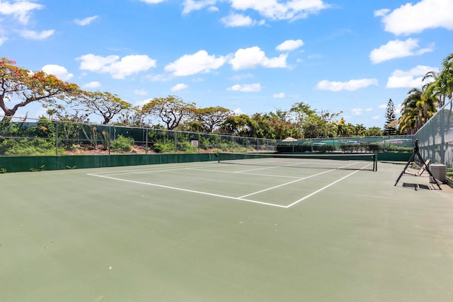 view of sport court with fence