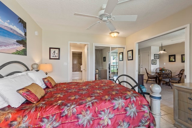 bedroom featuring ceiling fan, a textured ceiling, ensuite bathroom, and light tile patterned floors
