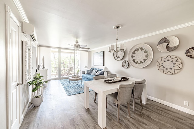 dining space featuring wood finished floors, a wall mounted air conditioner, and ornamental molding