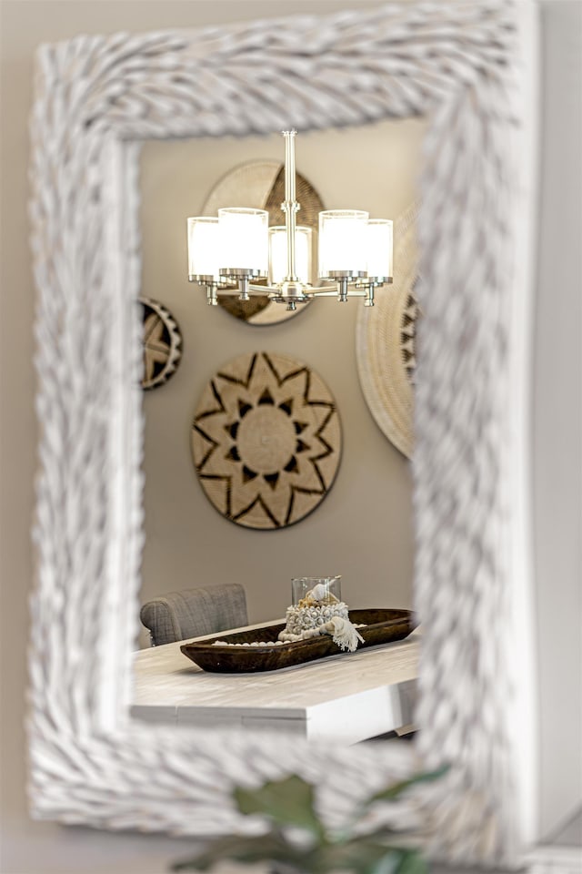 details with an inviting chandelier