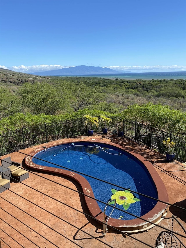 view of pool featuring a mountain view