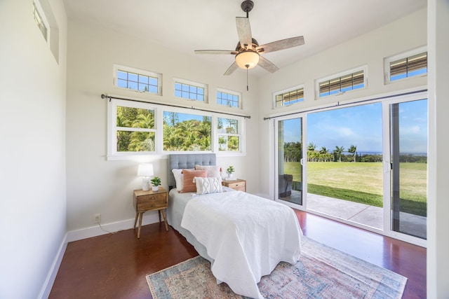 bedroom with a ceiling fan, baseboards, and access to outside