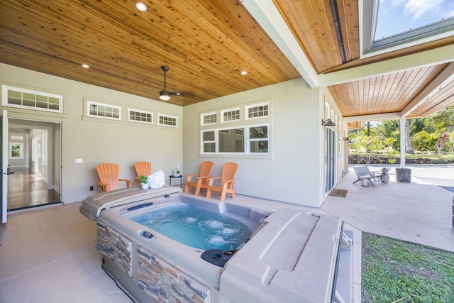 view of patio with a hot tub