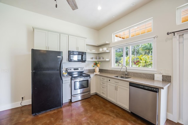 kitchen with black appliances, a sink, open shelves, finished concrete floors, and baseboards