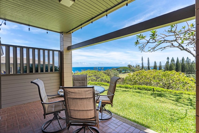 view of patio / terrace with a water view