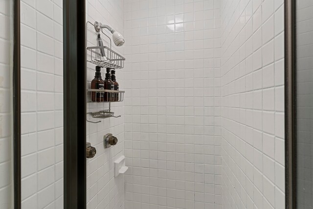 bathroom featuring an enclosed shower