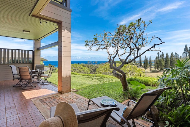 view of patio / terrace with a water view