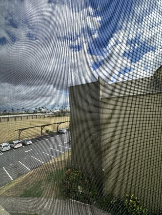 111 Kahului Beach Rd Unit A407, Kahului, HI 96732 - exterior space with parking