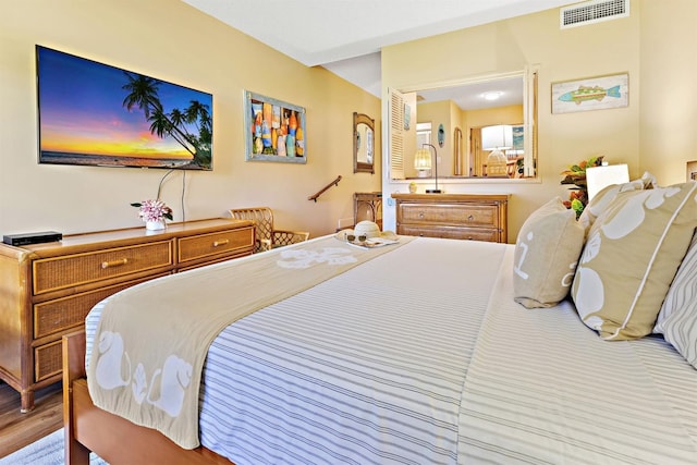 bedroom featuring light hardwood / wood-style floors