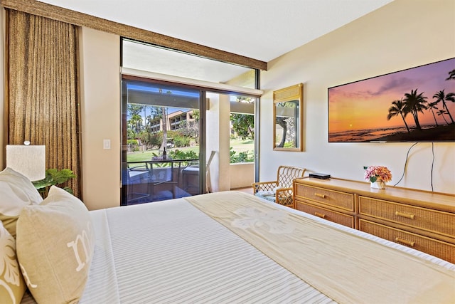 bedroom with access to exterior and beam ceiling