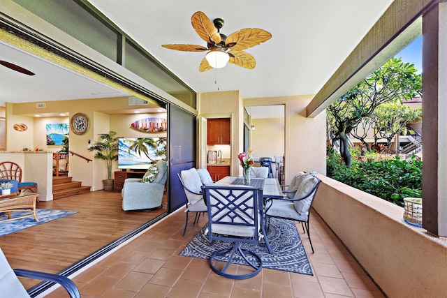 interior space featuring ceiling fan