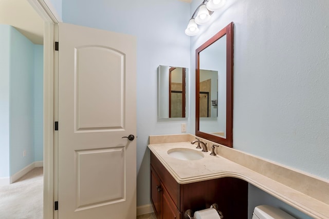 half bath with toilet and vanity