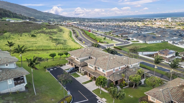 birds eye view of property with a residential view and a mountain view