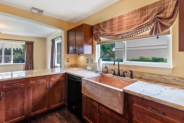 kitchen featuring black dishwasher, sink, plenty of natural light, and dark hardwood / wood-style floors