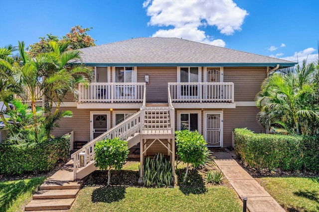 view of front of house with a balcony