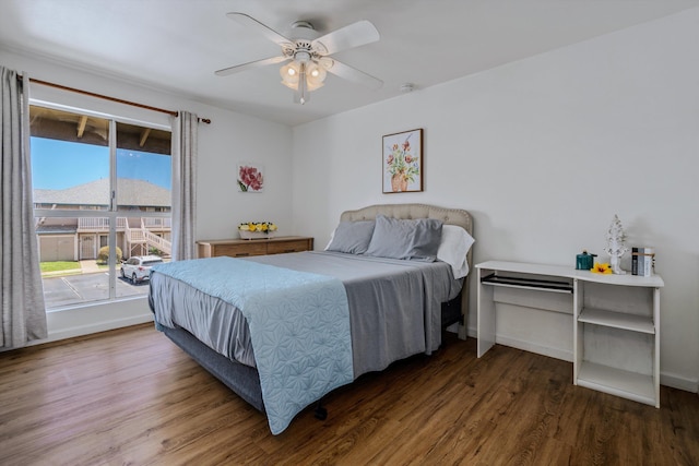 bedroom featuring dark wood-type flooring and ceiling fan