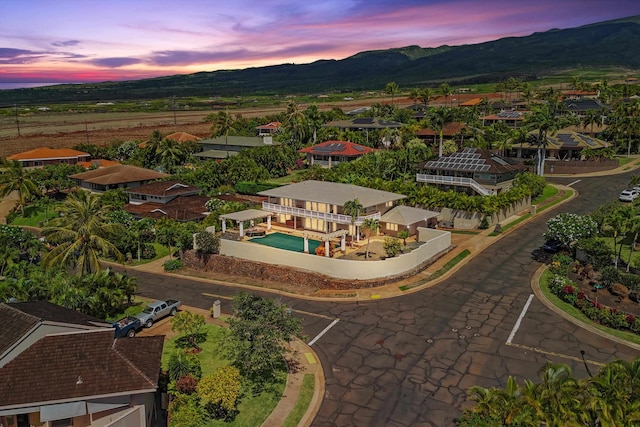 aerial view at dusk with a mountain view