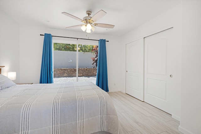 unfurnished bedroom featuring a closet, light wood-type flooring, access to outside, and ceiling fan