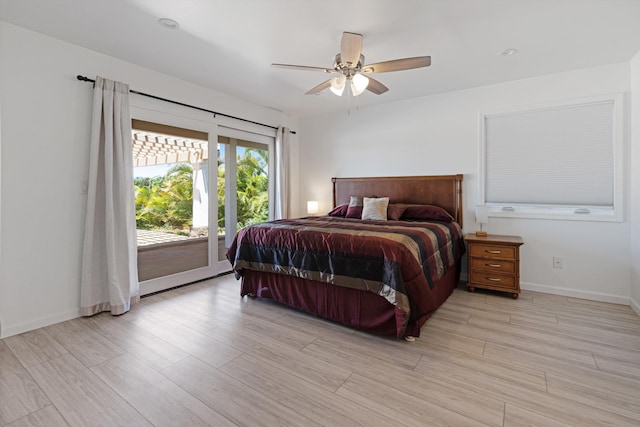 bedroom featuring ceiling fan, access to outside, and light wood-type flooring