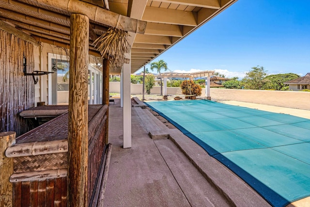 view of swimming pool featuring a patio