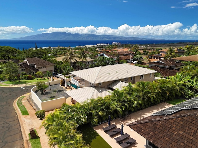 bird's eye view featuring a water and mountain view