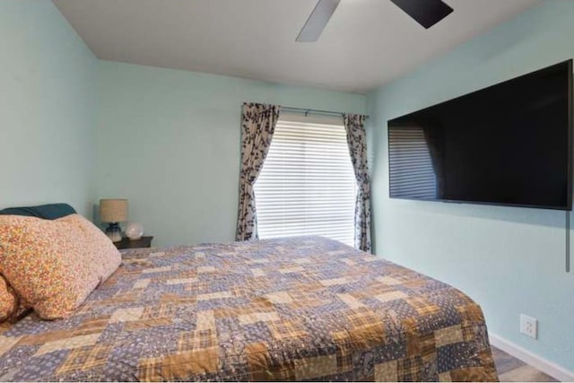 bedroom featuring ceiling fan