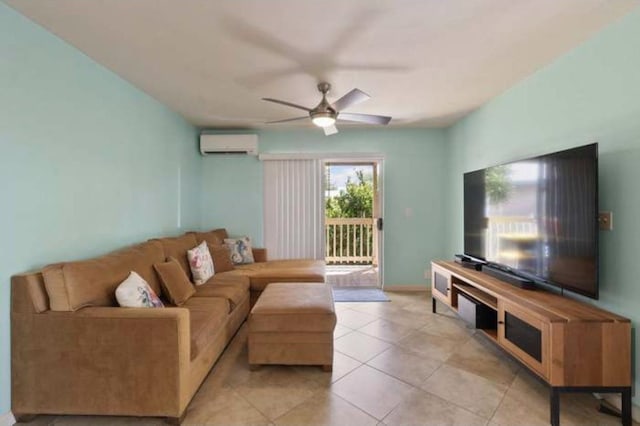 tiled living room featuring an AC wall unit and ceiling fan