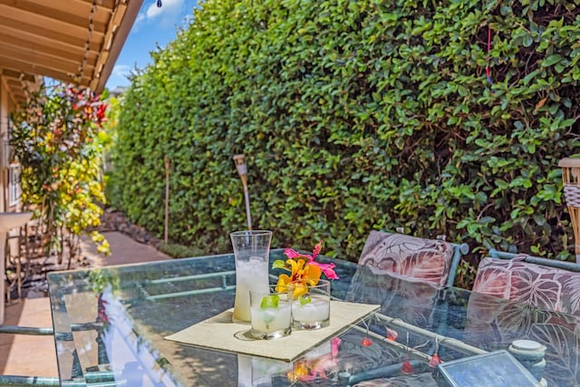 view of patio featuring outdoor dining area
