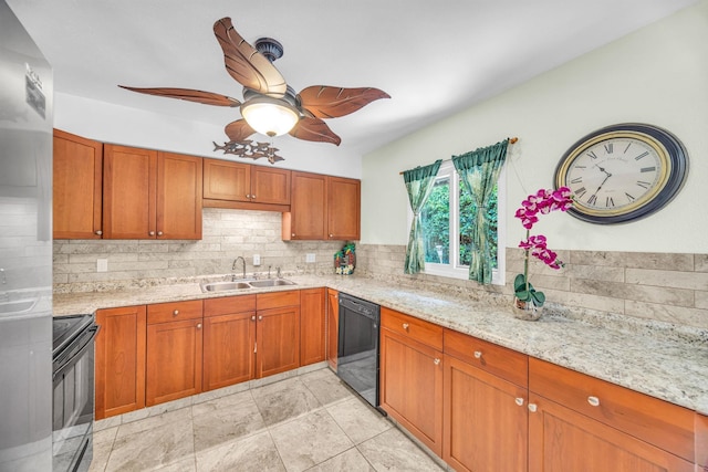 kitchen with black appliances, brown cabinets, and a sink