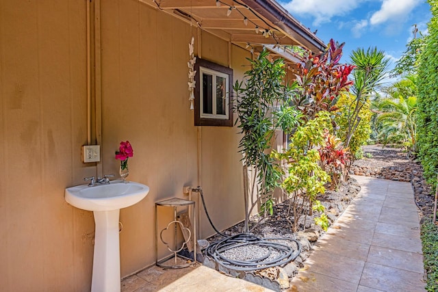 view of home's exterior featuring a sink