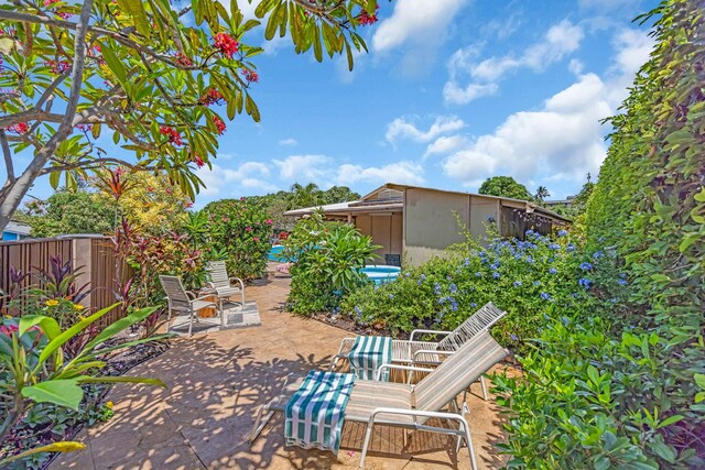 view of patio / terrace with fence