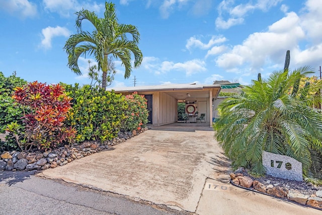 doorway to property featuring driveway