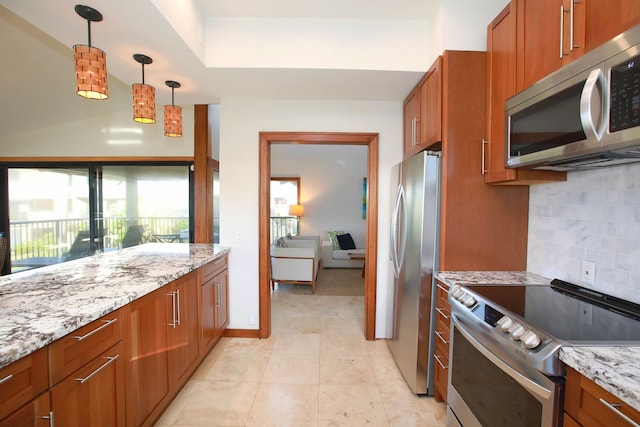 kitchen with pendant lighting, light tile floors, tasteful backsplash, appliances with stainless steel finishes, and light stone counters