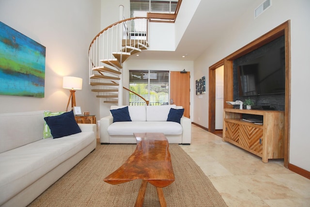 living room with light tile flooring