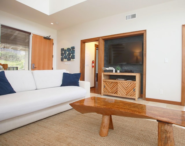 living room with light hardwood / wood-style flooring