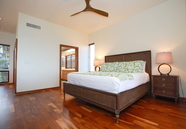 bedroom with ceiling fan and dark wood-type flooring