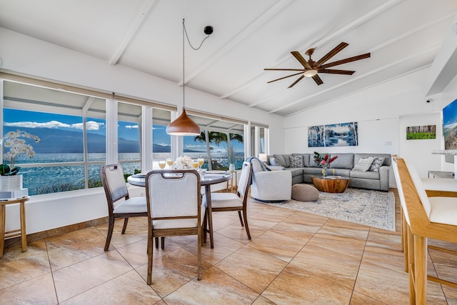 tiled dining area featuring a water view, ceiling fan, and lofted ceiling with beams