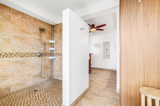 bathroom with ceiling fan, tile patterned floors, and tiled shower