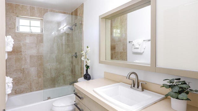full bath with toilet, tub / shower combination, and vanity