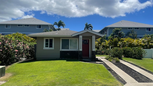 view of front facade with a front yard