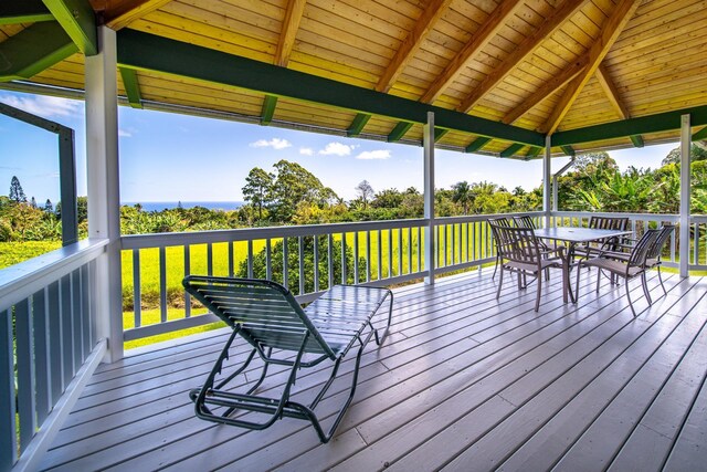 deck with a gazebo and a yard