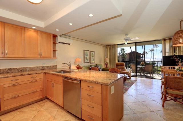 kitchen with a wall unit AC, kitchen peninsula, dishwasher, light tile patterned flooring, and sink