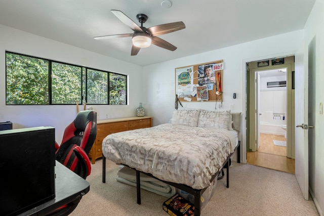 carpeted bedroom featuring ceiling fan