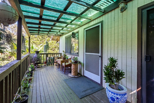 wooden deck with a pergola